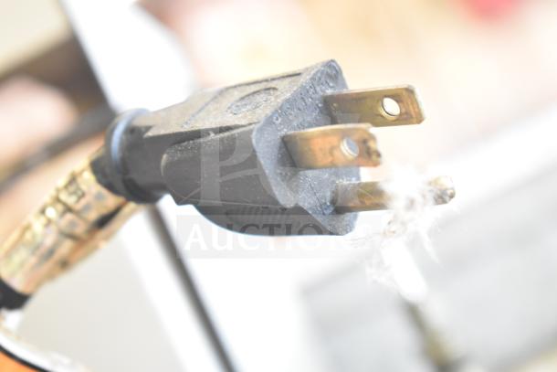 Close-up of a power plug for a Baxter Commercial Gas Powered Mini Rotating Rack Oven.
