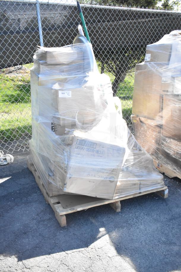 Pallet of 22 scratch and dent items, including Glad trash can, table base, and rod, wrapped in plastic for auction.