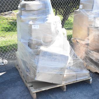 Pallet of 22 scratch and dent items, including Glad trash can, table base, and rod, wrapped in plastic for auction.