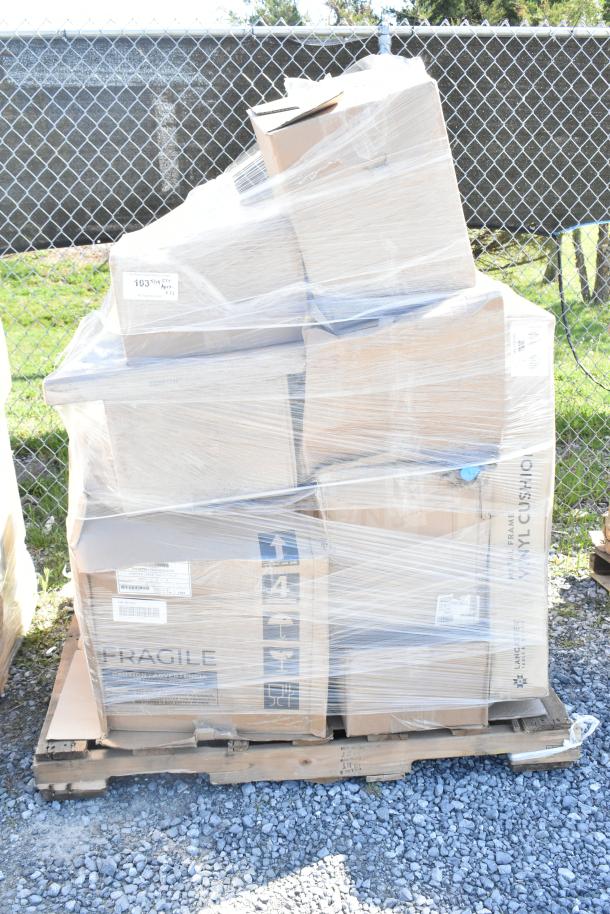 Pallet with brand new, scratch and dent items including containers and hood filters. Visible labels indicate fragile contents.