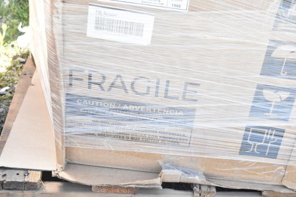 Packaged items labeled "FRAGILE" and "CAUTION," wrapped in plastic. Includes containers, hood filters. Scratch and dent condition. Tags show item numbers.