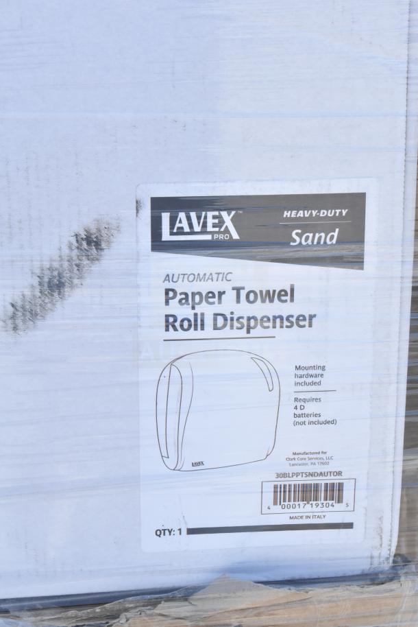 Lavex Pro automatic paper towel dispenser in original packaging, heavy-duty sand, requires 4 D batteries, mounting hardware included.