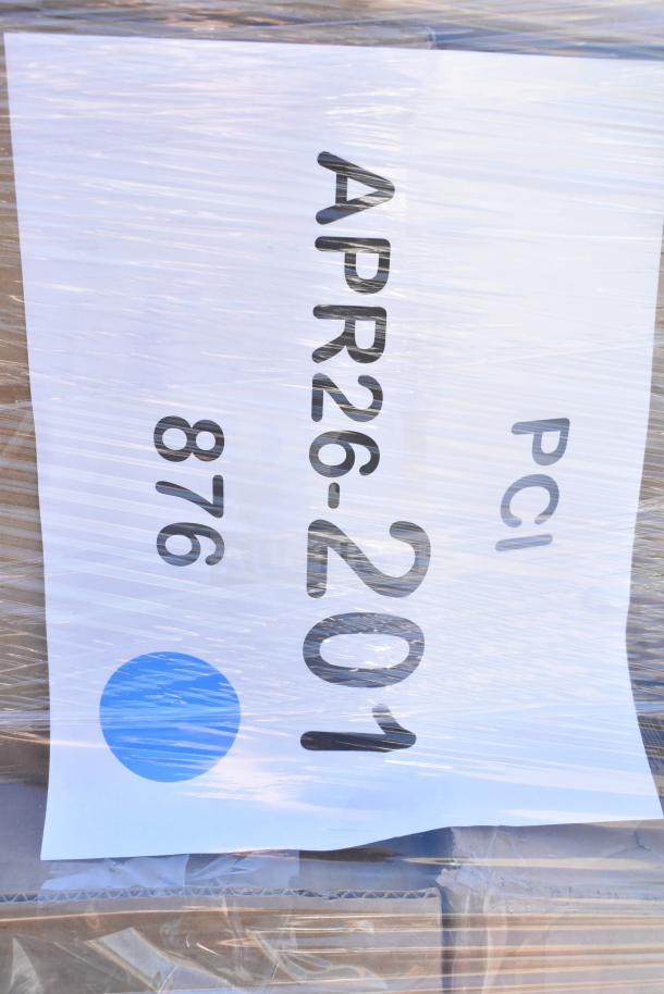 Pallet wrapped in plastic, tagged "APR26-201" with blue dot, containing 40 new scratch and dent items like dispensers and jars.