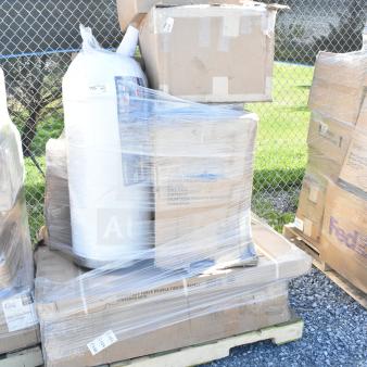 Pallet with 12 assorted brand new scratch and dent items, including motor assembly and wok, wrapped in plastic.