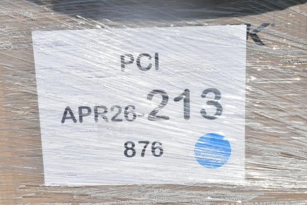 Wrapped pallet with label marked "PCI APR26-213 876." Contains new scratch and dent items like cups, napkins.