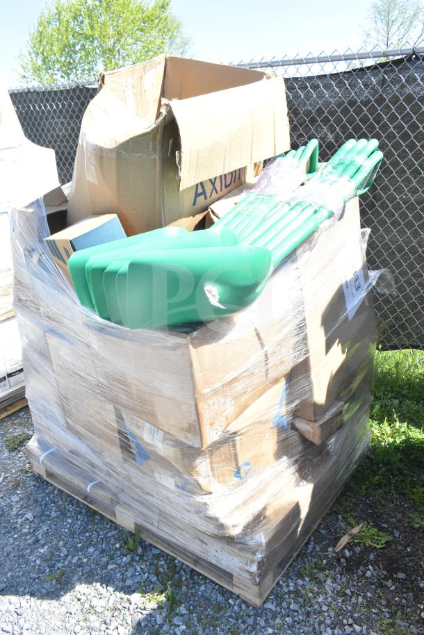 A pallet of 32 Vikan green food service shovels, new with scratch and dent imperfections, in original boxes.