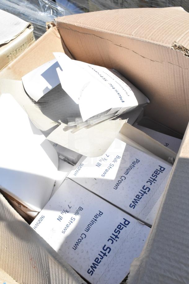 Cardboard box with 18 new scratch and dent items, including coffee cup collars, straws, and WBS-13 bags. 
