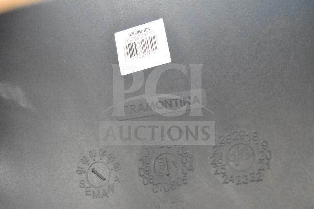 Tramontina label on a surface with manufacturing markings and a barcode sticker indicating model "92036/009" for an armchair.