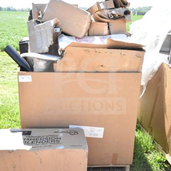 17 new scratch and dent items, including dispenser and table base pieces, in assorted boxes. Auction lot with visible labeling.