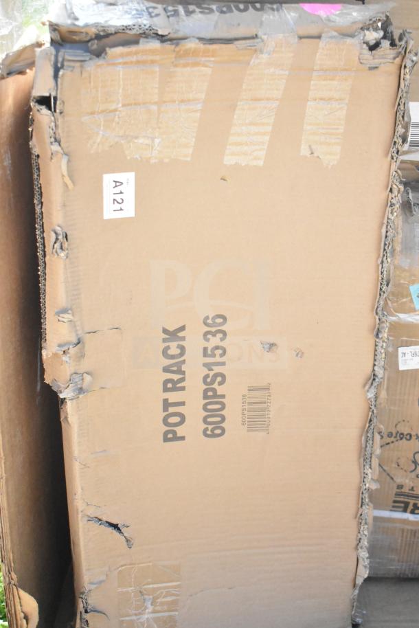Cardboard box labeled "POT RACK 600PS1536" with visible wear and tear. Contains new scratch and dent items.