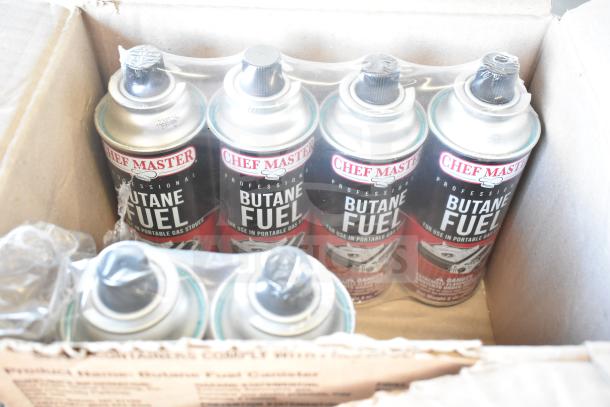 Box of Chef Master butane fuel cans, ideal for portable stoves, included with a whipped cream dispenser. Auction 2x bid offer.