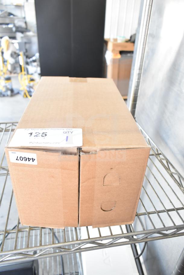 Boxed Insinkerator HWT Instant Hot Water Tank on shelf, labeled "44607" and "125 QTY 1". 115 Volts, 1 Phase.