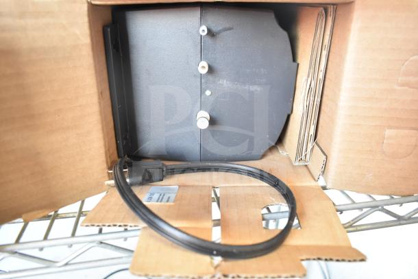 Insinkerator HWT Instant Hot Water Tank, 115 Volts, 1 Phase, black, with power cord, in original cardboard packaging.