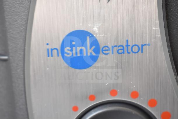 Insinkerator HWT Instant Hot Water Tank logo on brushed metal surface, 115 volts, 1 phase, in good condition.