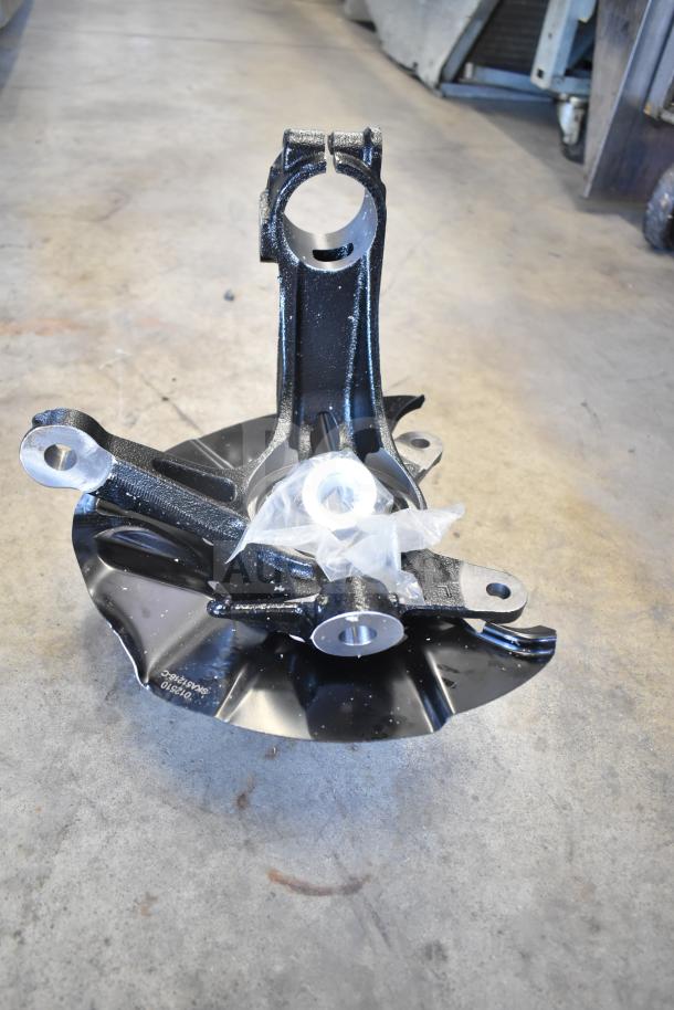 Lot of various items including gauges, hoses, and metal pieces. Shown: black metal component with drilled holes, plastic wrap present.