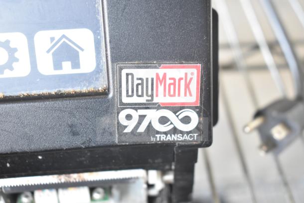 DayMark 9700 Simple Food Prep Labeler, black casing, visible DayMark logo and model label, used condition.
