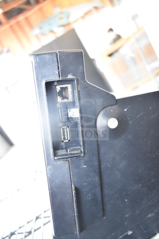 DayMark 9700 Simple Food Prep Labeler, USB and Ethernet ports, black casing, good condition, slight surface wear.
