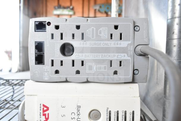 2 APC Back-UPS CS 350 units, featuring surge only and battery backup outlets, well-maintained condition.