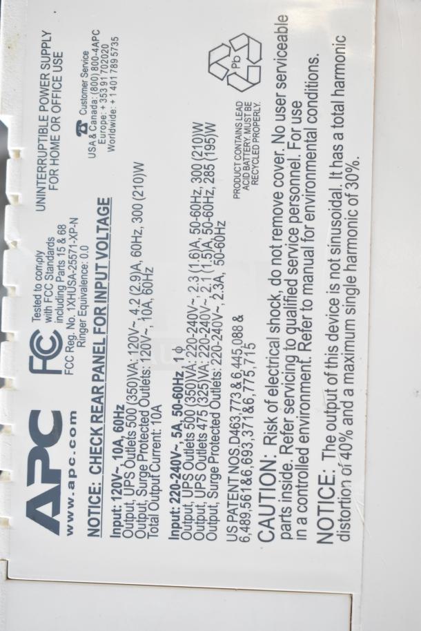 Label on APC Back UPS CS 350 showing specifications: input, output, voltage, and safety information.
