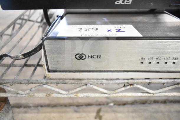 Two Acer monitors with NCR Kitchen Controller. Includes visible NCR branding and status indicators. Auction lot "2 Times Your Bid."