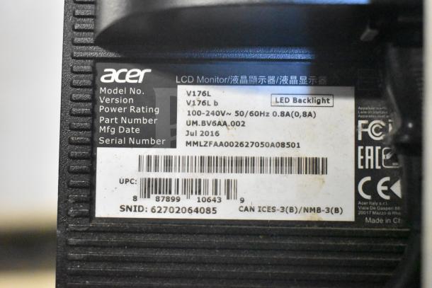 Label on back of Acer V176L LCD monitor showing model, version, power rating, part number, manufacturing date, and serial number.