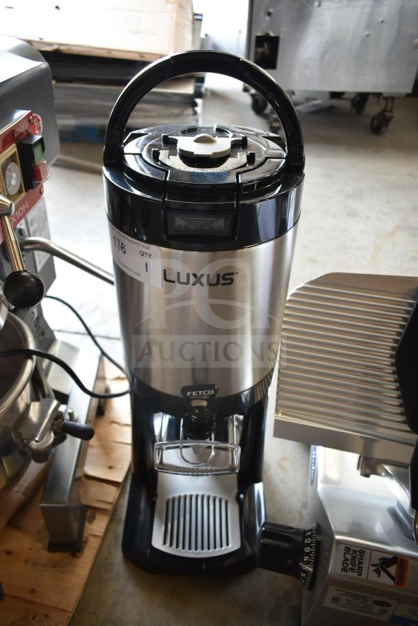 BRAND NEW Fetco L4D-15 Luxus 1.5-gallon stainless steel coffee server with stand, minor cosmetic scratches.