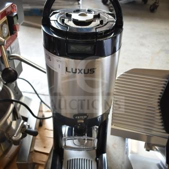 BRAND NEW Fetco L4D-15 Luxus 1.5-gallon stainless steel coffee server with stand, minor cosmetic scratches.