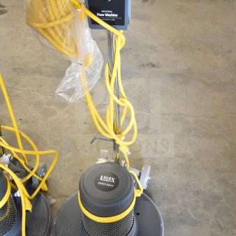 Brand new Lavex Pro 978LPS20S 20" heavy-duty rotary floor machine, 175 RPM, 120V, visible yellow cord, minor scratches.