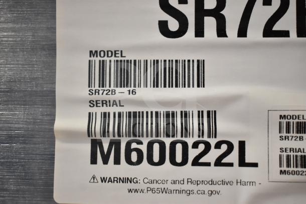 Label showing model SR72B-16 and serial M60022L for a 2022 Hoshizaki Steelheart Sandwich Prep Table. Warning notice present.