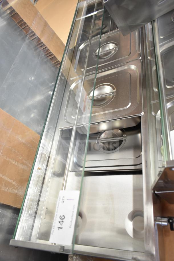 Brand new Avantco 177BMFW5 57" electric bain marie buffet countertop food warmer with five half-size wells, visible tag.