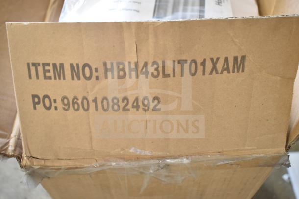 Cardboard box displaying item number HBH43LIT01XAM and PO number 9601082492 for a white Litchfield shower curtain.