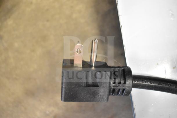 Black electrical plug from Galaxy 177GCT10 Commercial Conveyor Toaster, 120V, 1 Phase, slight scratch visible on casing.
