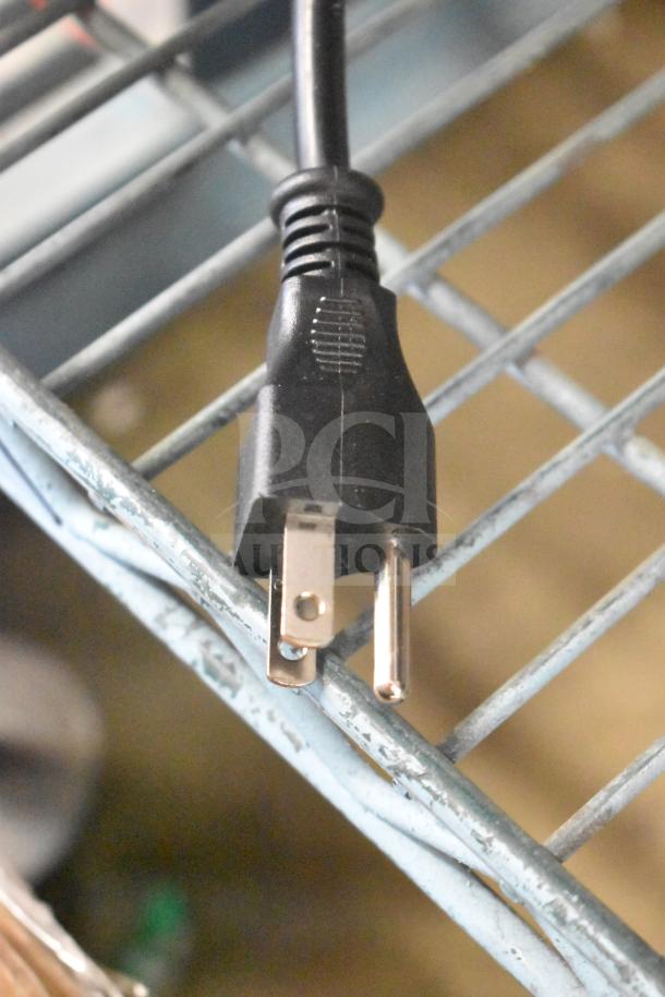 Close-up of a power plug for the Galaxy 177LT06A 6 Tray Stainless Steel Food Dehydrator. 120 Volts, 1 Phase.