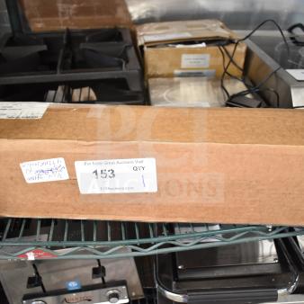 Brown box containing a brand new Manitowoc AR-10000P Arctic Pure Plus Ice Machine Water Filtration System, .5 Micron, 0.75 GPM.