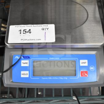 BRAND NEW AvaTek 334PCOS20 digital portion control scale, 20 lb. capacity, slight scratch, tare and hold functions visible.