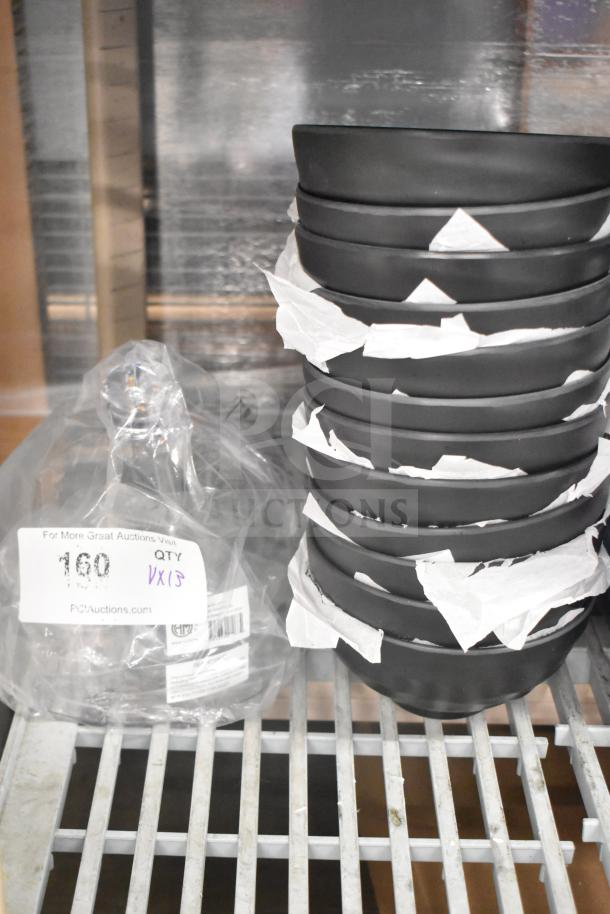 13 brand new scratch and dent items, including stacked black bowls and American Metalcraft LFTD8 clear dome cover.