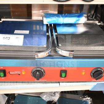 Brand new Avantco 177PG400S dual panini grill, 19 5/8" x 9 1/8" cooking area, smooth plates, minor surface blemishes.