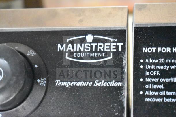 Mainstreet 177F20E electric fryer dial with temperature settings. Markings show Mainstreet Equipment logo and safety notes.