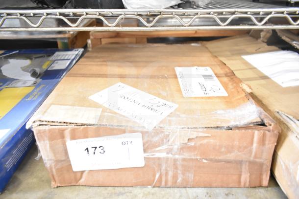 Cardboard box containing a brand new 9142DOT oven thermometer and 176MUF12C7OZ Baker's Lane muffin pan, visible labels.