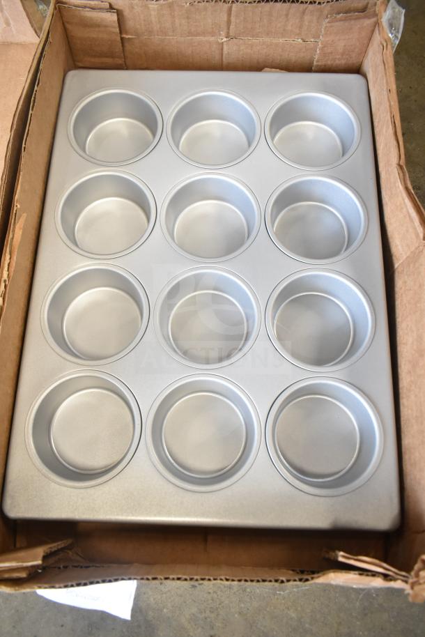 Box with Baker's Lane 12 Cup 7 oz. Glazed Aluminized Steel Jumbo Muffin Pan, 13" x 18", new condition.