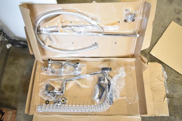 Brand new 190PRW812 wall-mounted pre-rinse faucet, 8" centers, 12" add-on, chrome finish, minor scratches, in original packaging.