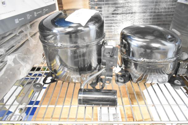 Two brand new Avantco compressors, models 17816586 and 17817638, for CPSS and CPW series, 115V, R290, on a shelf.