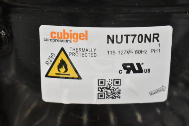 Cubigel compressor label showing model NUT70NR, 115-127V, R290 refrigerant, thermally protected, and safety markings.