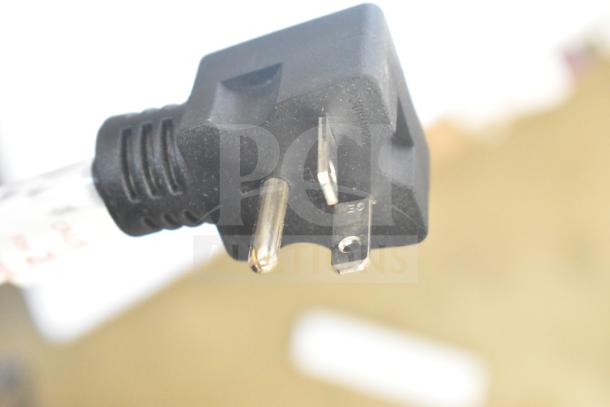 Close-up of power plug for Avantco 184THD27208 commercial toaster. Shows three-prong design for 208V connection.