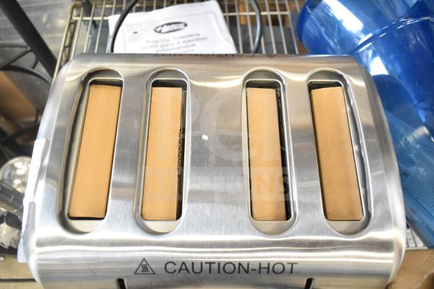 Brand new Hatco TPT-208 4-slice commercial toaster with 1 1/4" slots. "Caution-Hot" label visible. 208 volts, 1 phase.