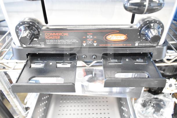 Brand new Hatco TPT-208 commercial toaster, 4 slice, 1 1/4" slots, 208 volts, scratch and dent condition.