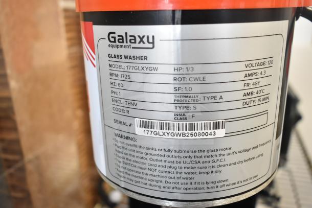 Brand new Galaxy 177GLXYGW Upright Five Brush Electric Glass Washer, 120V, 1 Phase, scratch and dent condition, label shows specs and warnings.