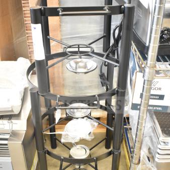 Three brand new Acopa wrought iron chafer stands, including 6 Qt. round and 4 Qt. half size, displayed in storage.