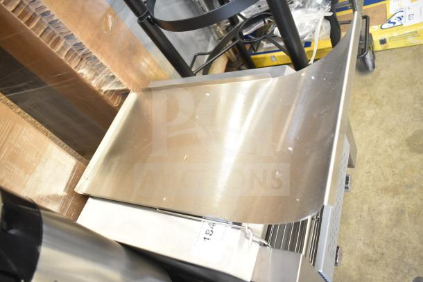 Brand new Avantco T140 10" wide conveyor toaster, 3" opening, 120V, 1750W, 300 slices/hour. Minor scratches visible.
