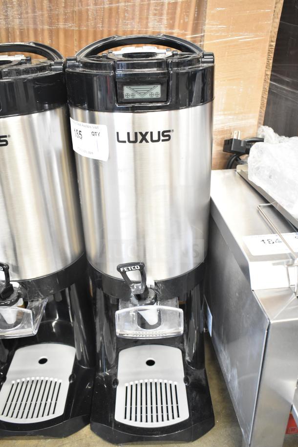 BRAND NEW SCRATCH AND DENT! Fetco L4D-20 Luxus 2 Gallon Stainless Steel Coffee Server with Stand. Minor surface blemishes.